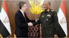  ?? — AFP photo ?? A handout picture shows Abdel Fattah (right) receiving Cohen in the capital Khartoum.