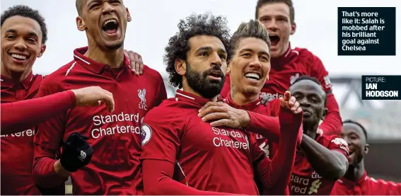  ?? PICTURE: IAN HODGSON ?? That’s more like it: Salah is mobbed after his brilliant goal against Chelsea