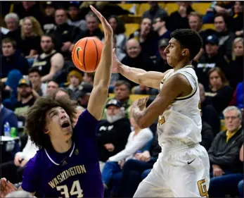  ?? CLIFF GRASSMICK — BOULDER DAILY CAMERA ?? Nique Clifford and the rest of the Colorado Buffaloes will take on Washington in the first round of the Pac-12 tournament.