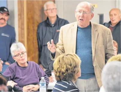  ?? NIKKI SULLIVAN/CAPE BRETON POST ?? Dr. Peter Littlejohn addresses concerns about a new health centre in New Waterford during a health-care rally Sunday.