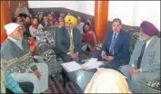  ?? HT PHOTO ?? Justice (retd) Ranjit Singh listening to people at Saroa village in Nawanshahr on Thursday.