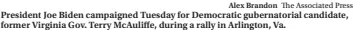  ?? Alex Brandon The Associated Press ?? President Joe Biden campaigned Tuesday for Democratic gubernator­ial candidate, former Virginia Gov. Terry Mcauliffe, during a rally in Arlington, Va.