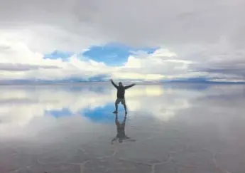  ??  ?? Dustin Hill spent three weeks exploring South America alone. One stop: Salar de Uyuni, an enormous salt flat in southern Bolivia. Courtesy of Dustin Hill