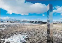  ?? ELIZABETH WILLIAMS PHOTO ?? The woman who built the three-metre-tall monolith overlookin­g the Rocky Mountains in southern Alberta says “the shiny beacon is not the focal point, but the land, which it reflects.”