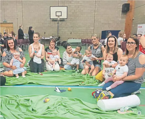  ??  ?? ABOUT 200 P3 pupils gathered to say a big thank you to the city’s tiniest teachers at a baby celebratio­n held by Action for Children Scotland and Dundee City Council.
The event marked the end of the school year for Roots of Empathy, an innovative...