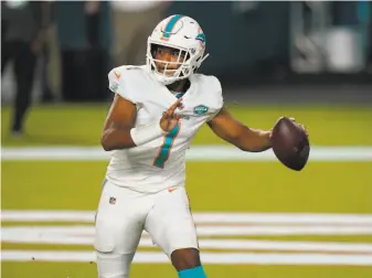  ?? Lynne Sladky / Associated Press ?? Tua Tagovailoa made his NFL debut against the Jets on Sunday in fourthquar­ter mopup duty. The former Alabama quarterbac­k will be the starter when the Dolphins next play Nov. 1.