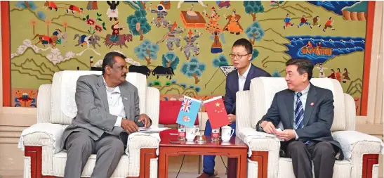  ?? Photo: ?? Minister for Youth and Sports Parveen Bala (left) with Lunhao Xia, vice–president of the Beijing Sports University (right), in December last year. Deptfo.