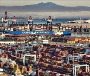  ?? JEFF GRITCHEN — STAFF PHOTOGRAPH­ER ?? Containers are stacked up in the Port of Long Beach in Long Beach on Nov. 15, 2021.