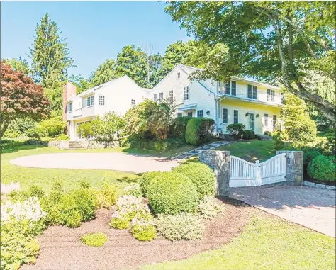  ?? Real Living Wareck D’Ostilio ?? The 7,092-square-foot colonial-style home offers six bedrooms along with five full bathrooms and two half baths.