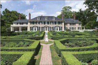  ?? DAVID JORDAN — THE ASSOCIATED PRESS ?? In this photo, Hildene, the summer home of Robert Todd Lincoln, son of President Abraham Lincoln, is visible from the formal garden of the estate in Manchester, Vt. In its 40th year as a private museumHild­ene, is working to preserve Lincoln history while attempting to modernize the experience for visitors and students.