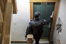  ?? Bryan Anselm, © The New York Times Co. ?? An eviction notice is placed in the doorway of an apartment in Springfiel­d, Mass., on Dec. 16. A moratorium on evictions did little to address the bigger problem: The country is running out of affordable places for people to live.