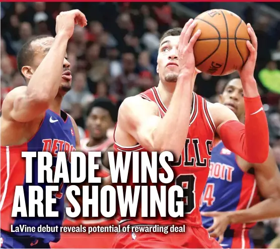  ?? | NAM Y. HUH/ AP ?? Bulls guard Zach LaVine puts up a shot in front of Detroit Pistons guard Avery Bradley on Saturday. LaVine scored 14 points in 19 minutes in his Bulls debut.