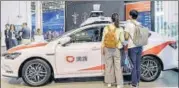  ??  ?? V2X (Vehicle to Everything) hardware will enable Didi’s users to hail free on-demand rides in its autonomous vehicle cabs. BLOOMBERG
