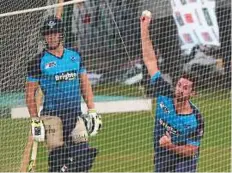  ?? AFP ?? World XI’s Ben Cutting bowls during a practice session at the Gaddafi Cricket Stadium in Lahore yesterday.