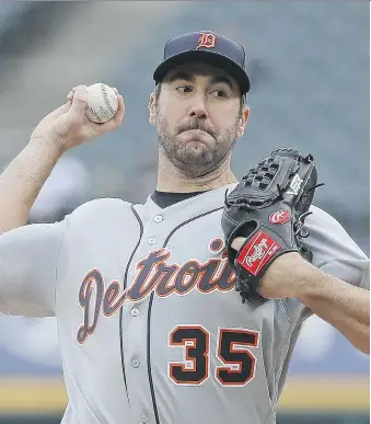  ?? JONATHAN DANIEL/GETTY IMAGES. ?? Justin Verlander pitches against the White Sox at opening day in Chicago. Verlander struck out 10 to match the most by a Detroit pitcher on opening day since Mickey Lolich in 1970.