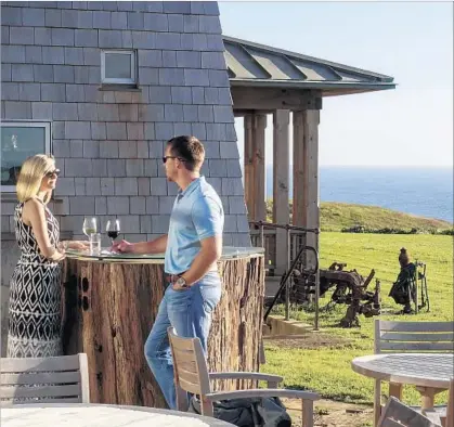  ?? Photograph­s by Paul Boorstin ?? INN AT NEWPORT RANCH guests enjoy compliment­ary wine and stunning views of the Mendocino Coast before dinner.