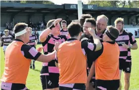  ??  ?? Joy boys Ayr celebrate their win over Watsonians