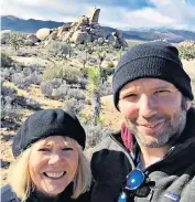  ??  ?? i Keeping mum: Simon with his mother at Joshua Tree National Park, where she got lost on a circular trail