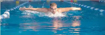  ?? EDDIE MOORE/JOURNAL FILE PHOTO ?? A member of a Canadian para-swimming team trains at a the Santa Fe community center.