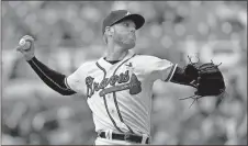  ?? John Bazemore / AP ?? Atlanta Braves starting pitcher Mike Foltynewic­z works in the first inning of Wednesday’s game against the Washington Nationals.