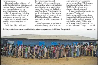  ?? PHOTOS / AP ?? Rohingya Muslims queue for aid at Kutupalong refugee camp in Ukhiya, Bangladesh.