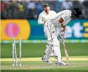  ?? PHOTOSPORT ?? Jeet Raval is bowled on day two of the first test against Australia in Perth.