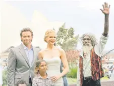  ?? — AFP file photo ?? David (right), posing for photos with actors Nicole Kidman (centre), Jackman (left) and Brandon Walters (below) for a photo following a press conference prior to the world premier for the movie ‘Australia’ in Sydney.