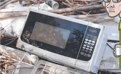  ?? . ?? NO HOT PIES IN HERE: A Collingwoo­d supporter’s microwave oven this week, destroyed after the match against Essendon when it was used to nuke a membership card.