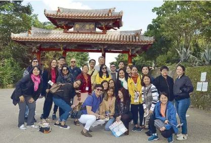  ??  ?? As the Okinawan saying goes, our tour group started out as strangers and ended up becoming family.