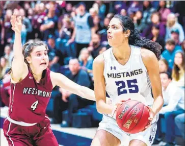  ?? Photograph­s by Darcy Brown ?? THE MASTER’S sophomore center Stephanie Soares is the NAIA Division I national player of the year.