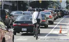  ?? STAN BEHAL / POSTMEDIA NETWORK. ?? Drivers must remember that cyclists are entitled to share the road and should be given a wide berth.