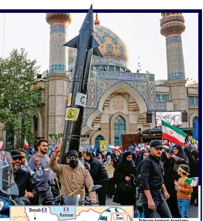  ?? ?? Tehran terror: Iranians celebrate drone attacks