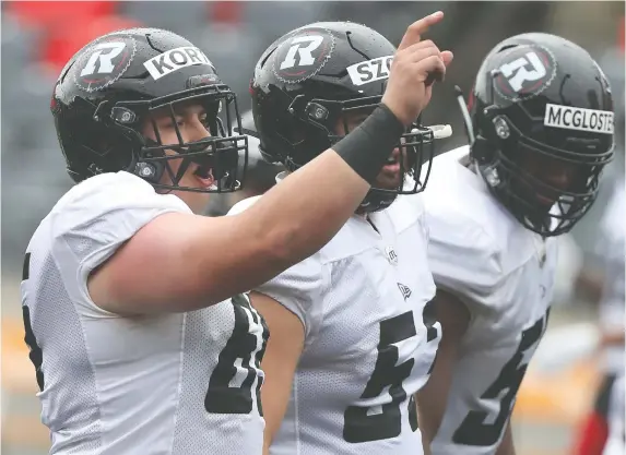  ?? TONY CALDWELL ?? With all-star centre Alex Mateas retiring, Mark Korte, left, is being asked to step up from tackle to centre. “It's a big transition,” he says.