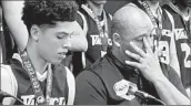  ?? ERIC SONDHEIMER Los Angeles Times ?? VALENCIA’S Bryce Bedgood listens as his dad, Bill, discusses his decision to step down as coach.