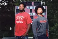  ?? Erik Trautmann / Hearst Connecticu­t Media ?? Wilbur Cross football players Armon Hyslop, left, and Jabez Cubiz on Saturday at the school in New Haven.