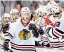  ?? HARRY HOW/GETTY IMAGES ?? The Blackhawks’ Jonathan Toews celebrates Saturday night after scoring in Game 7 of the Western Conference finals.