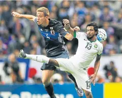  ?? EPA ?? Japan’s midfielder Keisuke Honda, left, in action during a World Cup qualifying match between Japan and Saudi Arabia.