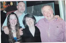  ??  ?? All smiles: (left) Catherine with David, son Charles and daughter Suzanne. Right: Catherine at her first book launch with Suzanne and grandchild­ren Lewis, Rumer and Indi. Below: Catherine’s two books