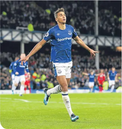  ??  ?? Dominic Calvert-Lewin celebrates his goal that secured the points for Everton against Huddersfie­ld