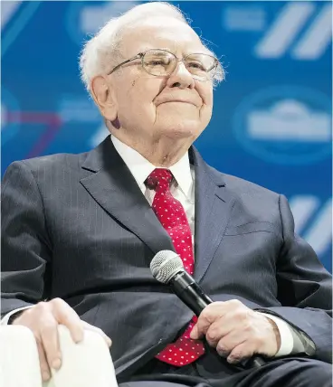  ?? SAUL LOEB / AFP / GETTY IMAGES FILES ?? Investor Warren Buffett wants to own companies with strong competitiv­e advantages that have earnings he can predict far into the future.