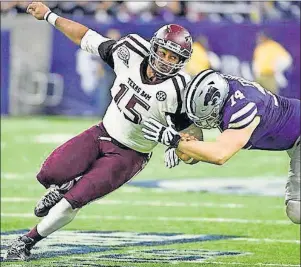  ?? AP PHOTO ?? In this December 2016 file photo, Texas A&M’s Myles Garrett (left) tries to get around Kansas State offensive lineman Scott Frantz during the Texas Bowl NCAA college football game in Houston. Garrett is among the top prospects in the upcoming NFL draft.