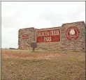  ?? Cat Webb ?? Salacoa Creek Park welcomes pets and owners to cool off at its beach between Memorial Day weekend and Labor Day weekend.