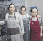  ??  ?? 0 Volunteers Roxy Delaney, Stacey Duff and Jeanie Dews at the Bite and Blether cafe in Gallatown, Kirkcaldy