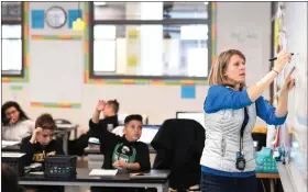  ?? RJ SANGOSTI — THE DENVER POST ?? Karen Giesler teaches seventh grade science at Prairie Heights Middle School in Evans on Nov. 1, 2019.