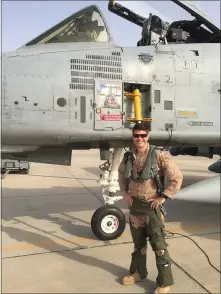  ?? PHOTO PROVIDED ?? Standing in front of his A-10 fighter plane is Lt. Col. William Rundell.