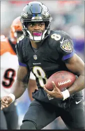  ?? RICH SCHULTZ/AP (JACKSON); ABBIE PARR/GETTY (RODGERS) ?? Lamar Jackson has given the Ravens a spark at QB. Aaron Rodgers will lead the Packers against the Vikings.