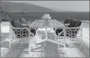  ?? AP/Castelle ?? A table and chairs set from the Barclay Butera Outdoor Collection for Castelle is handcrafte­d to capture luxury, sophistica­tion and designer chic.