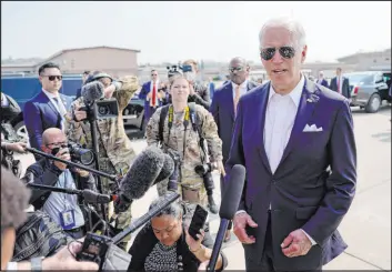  ?? Evan Vucci The Associated Press ?? President Joe Biden speaks Sunday at the end of a three-day visit to South Korea before boarding Air Force One for a trip to Japan at Osan Air Base in Pyeongtaek, South Korea.