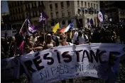  ?? DANIEL COLE — THE ASSOCIATED PRESS FILE ?? Protesters march during a demonstrat­ion in Marseille, southern France, to denounce a COVID-19 health pass needed to access restaurant, long-distance trains and other venues.