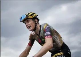  ?? AP PHOTO/THIBAULT CAMUS ?? Stage winner and new overall leader Denmark’s Jonas Vingegaard climbs Granon pass during the eleventh stage of the Tour de France cycling race over 152kilomet­ers (94.4 miles) with start in Albertvill­e and finish in Col du Granon Serre Chevalier, France, Wednesday, July 13, 2022.